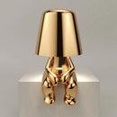 Denkerlampe i guld