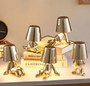 Denkerlampe i guld